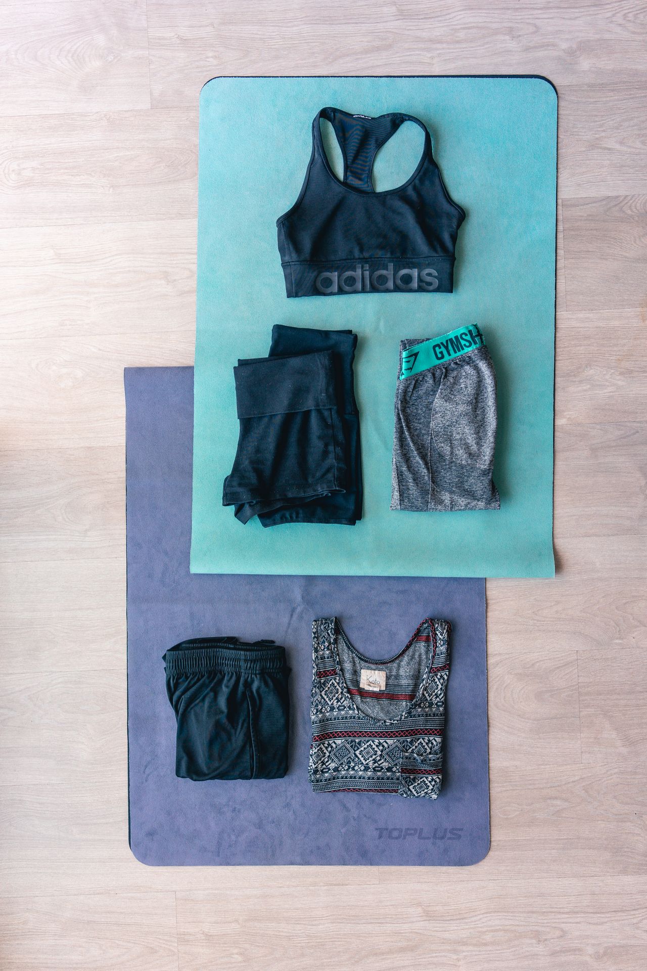 Girls' activewear laid out flat